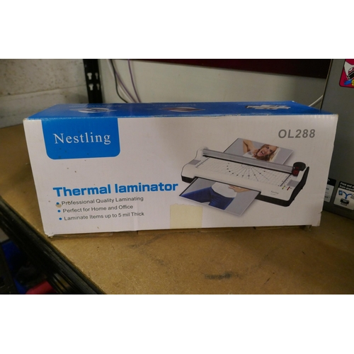 2122 - An Epson Picture Mate personal photo lab, a Nestling OL288 thermal laminator and an Epson Expression... 