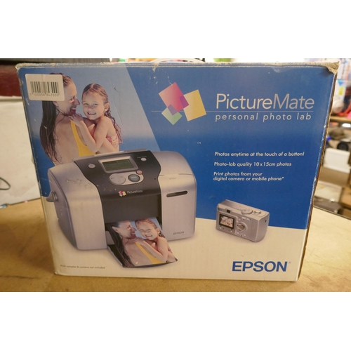 2122 - An Epson Picture Mate personal photo lab, a Nestling OL288 thermal laminator and an Epson Expression... 