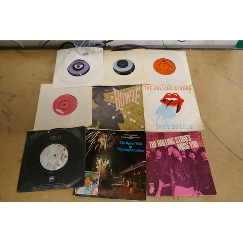 2132 - A box of 13 LPs and approx. 20 singles including Jo'Burg Hawk, Chicago, etc.