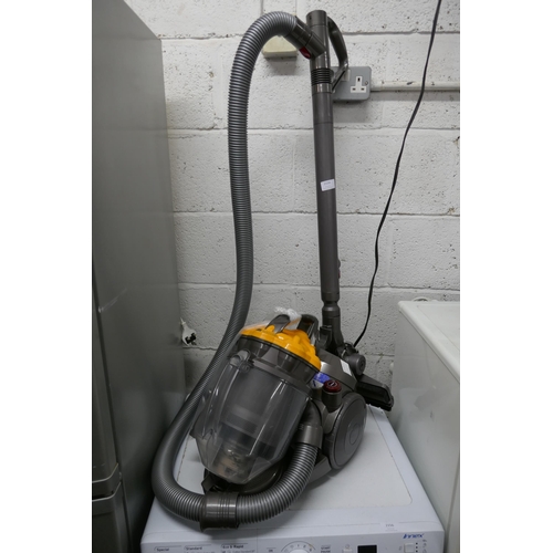 2154 - A Dyson Root Cyclone Cylinder vacuum cleaner with attachments