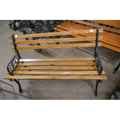 2161 - A 120cm wooden garden bench with cast iron bench ends