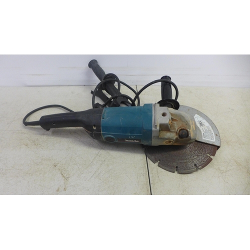 2033 - A Makita 9069 250mm angle grinder with grip and release tool, 240v, 2000w