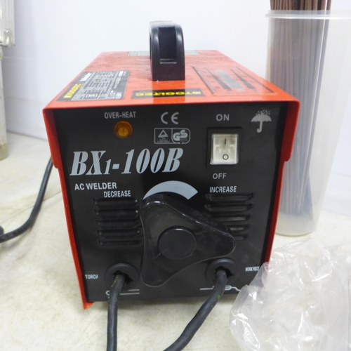 2046 - A Tooltech BX-100B stick welder, mask and electrodes