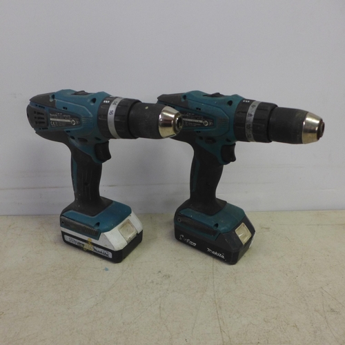 2051 - Two Makita HP457D 18v Li-ion cordless power drills with three batteries and charger - 14.4, 18v