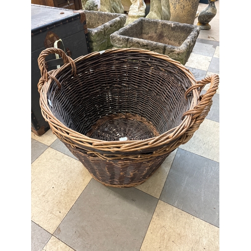 324 - Two wicker log baskets