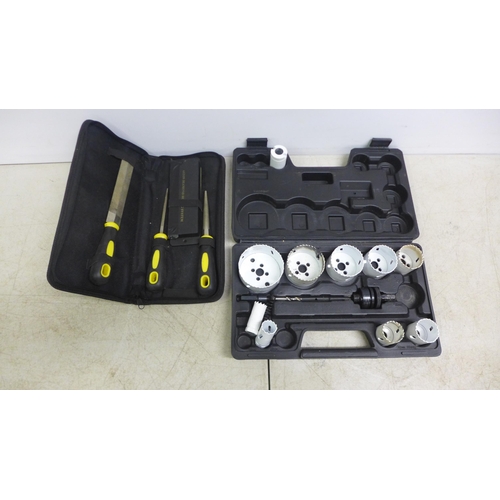 2094 - A hole drill set sizes 22mm to 78mm diameter, plus an Aston Diamond Honing kit (both used)