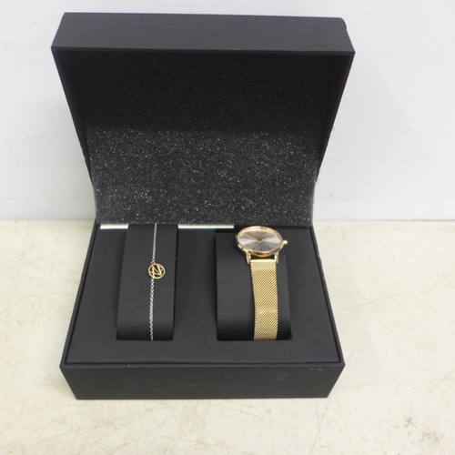 2095 - A lady's Rotary two tone stainless steel wristwatch and a lady's Armani Exchange rose gold wristwatc... 