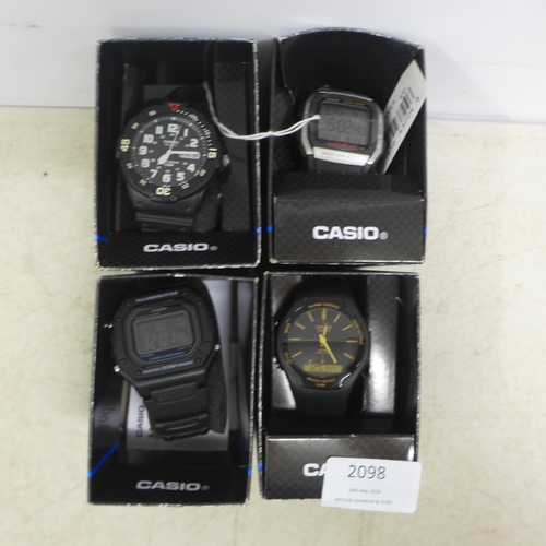 2098 - A Casio black diver's style wristwatch with black resin strap, a men's Casio power LCD digital wrist... 