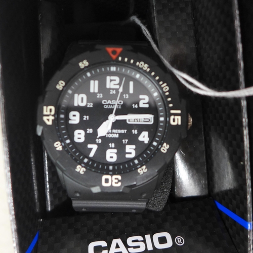 2098 - A Casio black diver's style wristwatch with black resin strap, a men's Casio power LCD digital wrist... 