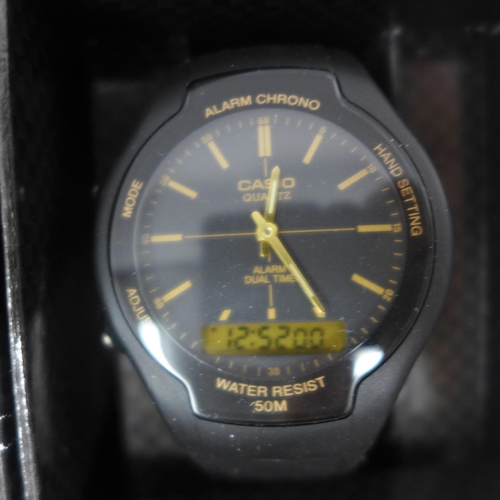 2098 - A Casio black diver's style wristwatch with black resin strap, a men's Casio power LCD digital wrist... 