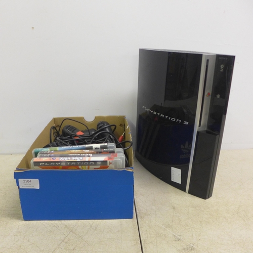 2104 - A PlayStation 3 console with 4 games including Band Hero, The Beatles Rockband, Def Jam Rapstar and ... 