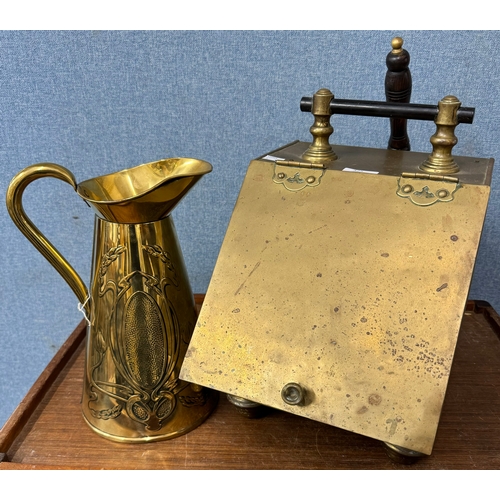 325 - An Art Nouveau brass jug, a brass coal scuttle and a brass bird cage