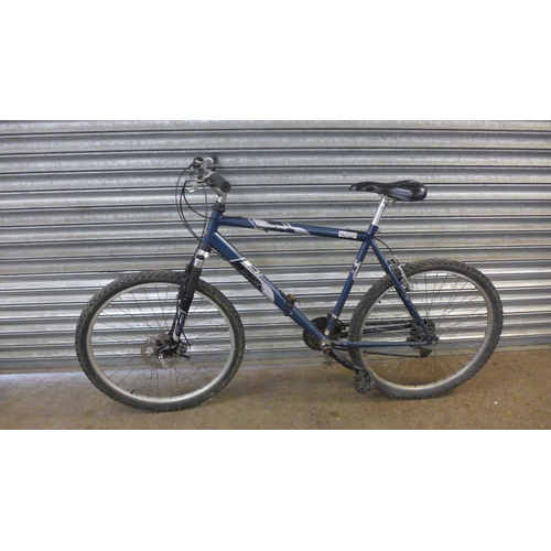 A men's Raleigh Tiger Shark 21-speed steel framed bike with hard tail and front disc brake