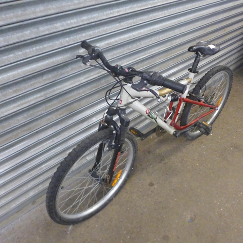 2168 - A Rockrider full suspension mountain bike with a size S steel frame