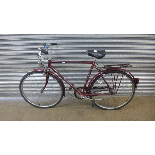 2177 - A vintage Raleigh Courier steel framed bike with pannier rack and mud guards