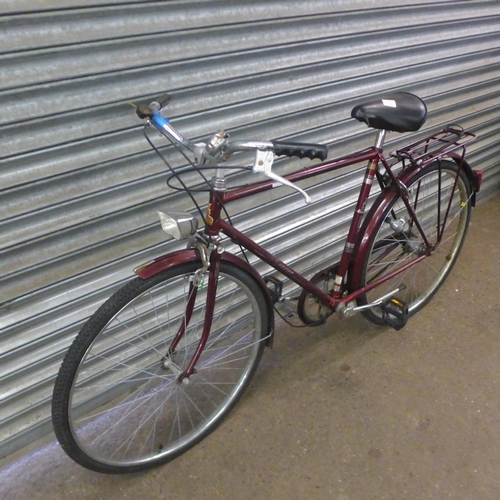 2177 - A vintage Raleigh Courier steel framed bike with pannier rack and mud guards