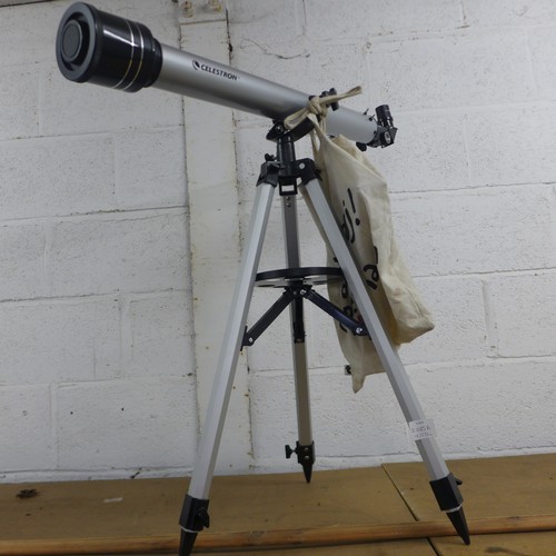 2085A - A Celestron #21041 D = 60mm, f = 800mm telescope with adjustable tripod stand and an assortment of a... 