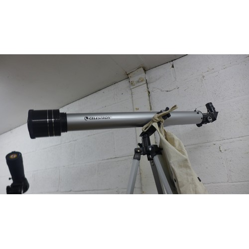 2085A - A Celestron #21041 D = 60mm, f = 800mm telescope with adjustable tripod stand and an assortment of a... 