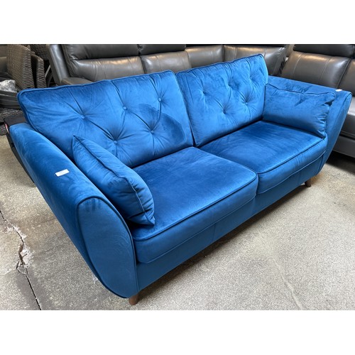 1487 - Blue velvet Hoxton three seater sofa