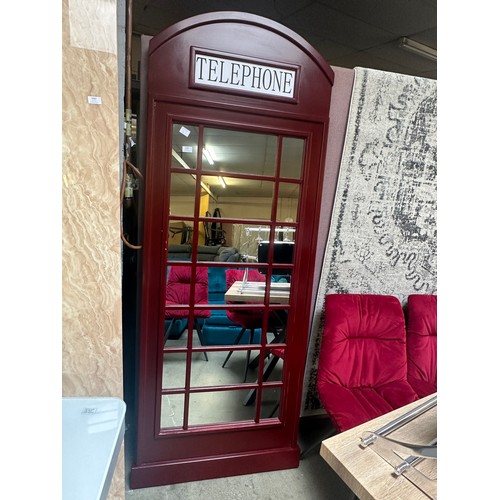 1498 - A large mirror in the form of a telephone box