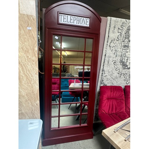 1498 - A large mirror in the form of a telephone box