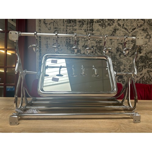 1500 - A polished chrome luggage rack