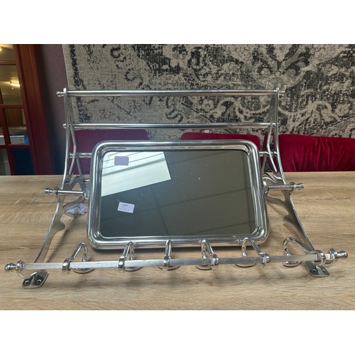 1500 - A polished chrome luggage rack