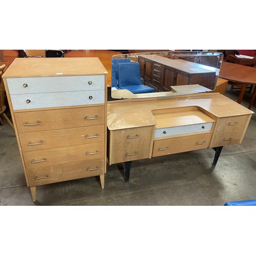 76 - An oak dressing table and chest of drawers