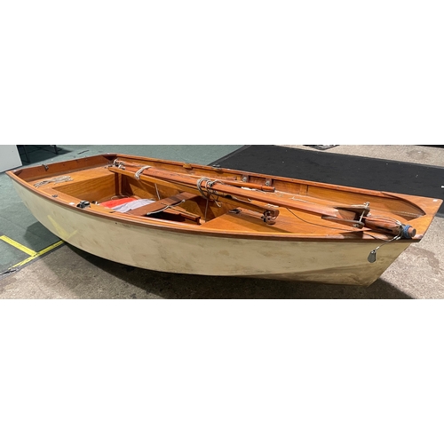 414 - A 10ft Mirror dingy sailing boat with mast, sail, oars, rudder and other accessories.