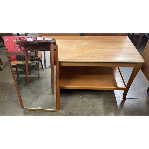 80 - A teak framed mirror and a coffee table