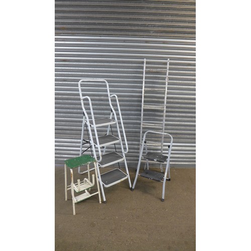 2185 - A set of aluminium stepladders, a set of 4-rung safety steps, a set of 2 rung steps and a folding st... 