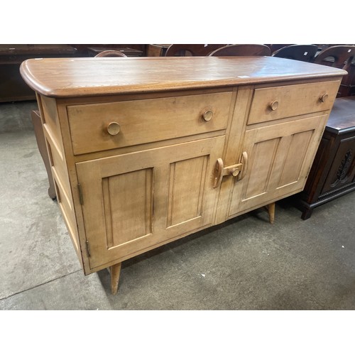 90 - An Ercol Blonde elm and beech sideboard