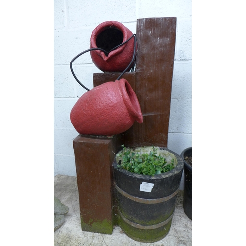 2230 - A resin two jug water fountain