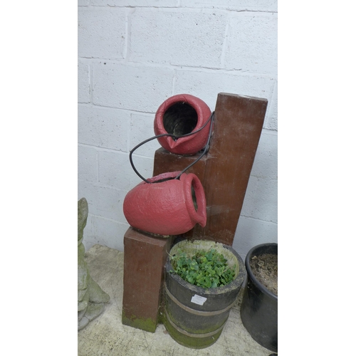 2230 - A resin two jug water fountain