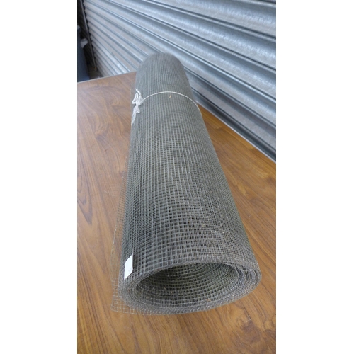 2234 - A roll of 1cm square mesh wire fencing