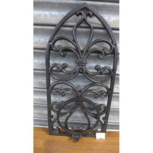 2243 - A selection of cast iron wall mounted planters, hanging baskets and wall brackets