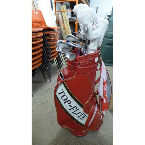 2251 - A set of women's golf clubs including a full set of Yonex A.D.X. FL100 irons, a Prosimmon putter, a ... 