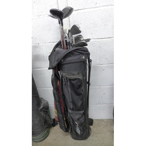 2254 - 5 Bags of golf irons, drivers and putters including Big Ezee, Ram, Delta, Donnay and Spalding and Se... 