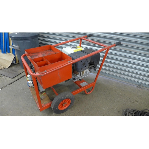 2263 - A petrol welder with 60ft earth cable, 64ft work cable, 16 amp and 110v outlet - W