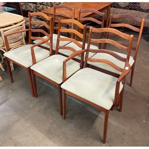 96 - A set of six teak dining chairs