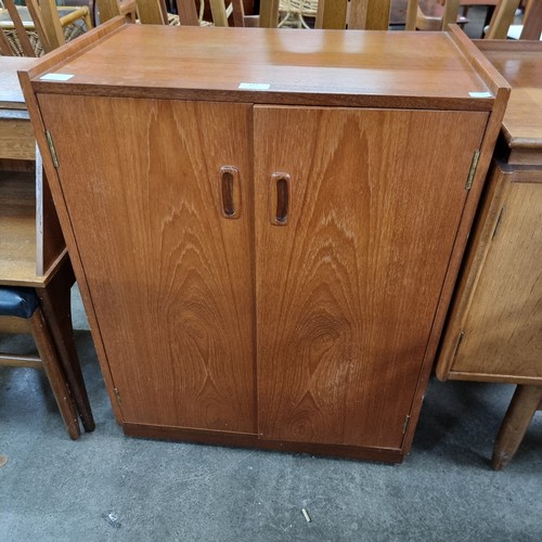 122 - A teak record cabinet