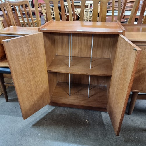 122 - A teak record cabinet