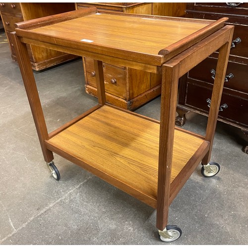 98 - A teak and simulated rosewood cocktail trolley