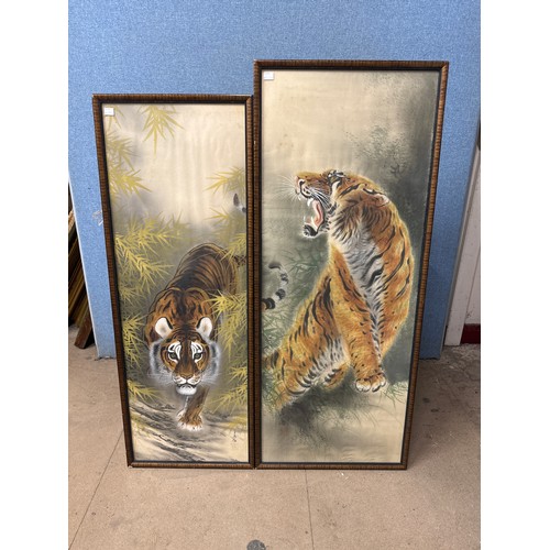 366B - Two oriental paintings on silk, studies of tigers, framed