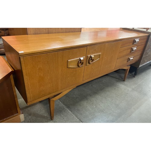 106 - A teak sideboard