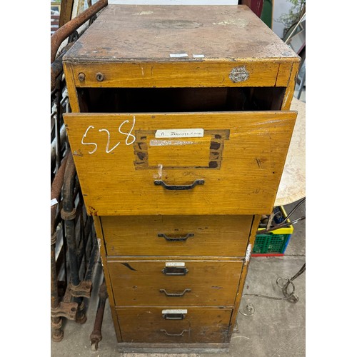 299 - An oak filing cabinet