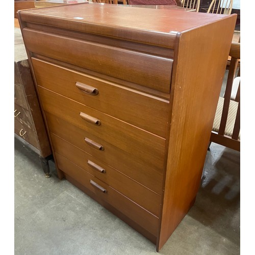 110 - A teak chest of drawers