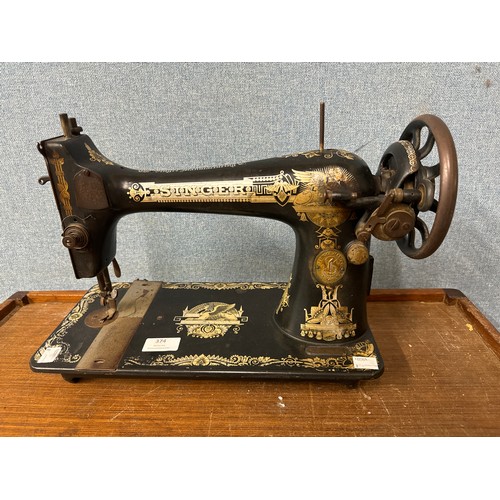 374 - A Singer K127 model sewing machine