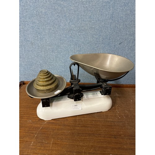 380 - A set of Avery weighing scales and graduated brass weights