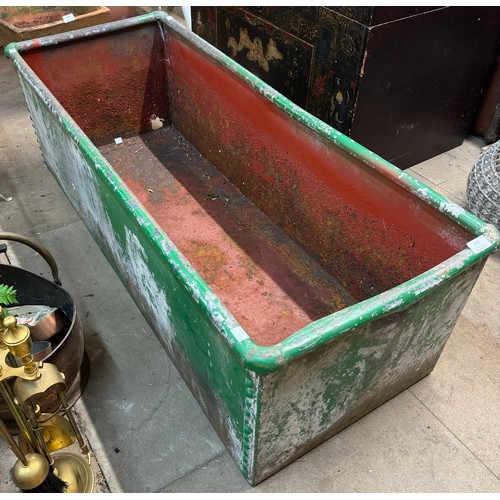 338 - A large galvanised trough